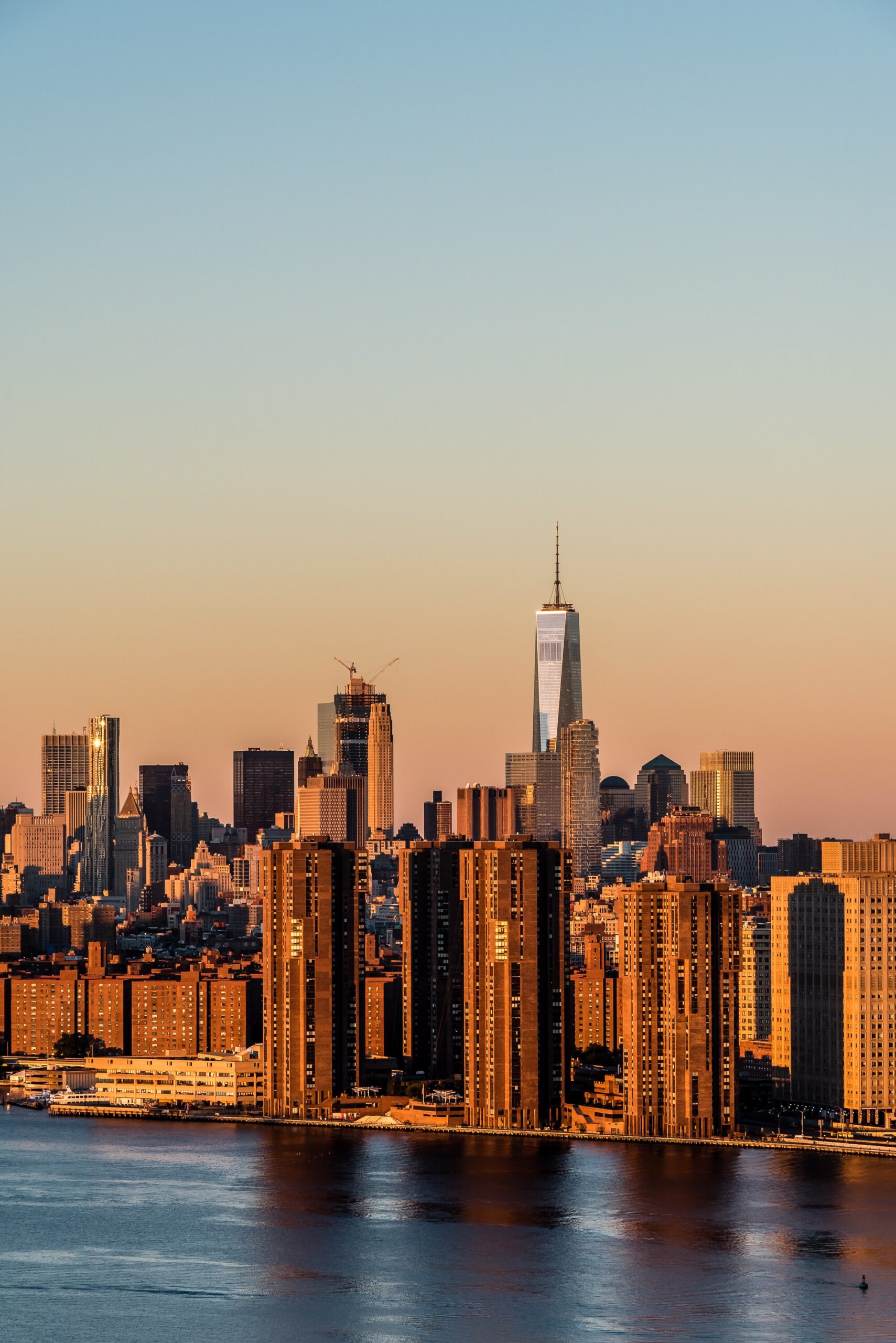 sun-kissed-view-of-lower-manhattan-skyline-at-sunr-2023-11-27-05-15-47-utc